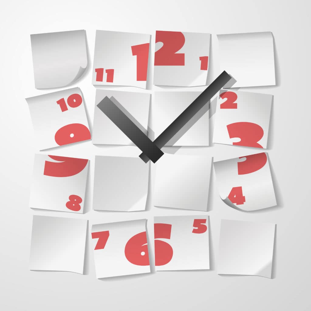 Illustration of a clock cut into separate pieces of paper, symbolizing the frequent timing of cluster feeding sessions during a baby’s growth spurt.